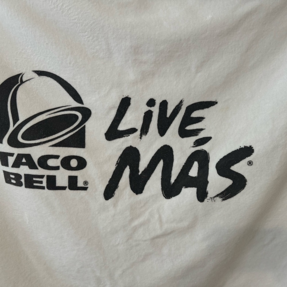 Live mas Taco Bell Pepsi beach towel.